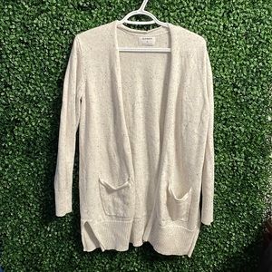 Crème cardigan with black accents